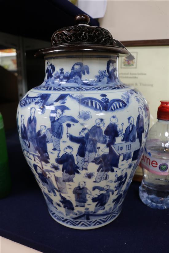 A Chinese blue and white Hundred Boys vase, Transitional period c. 1640, wood stand and cover